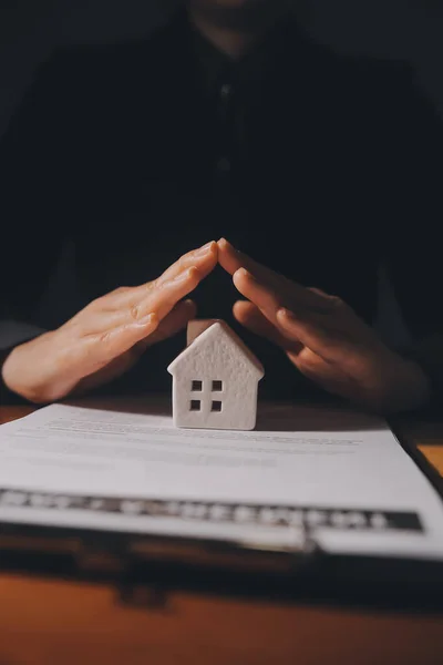 depositphotos_689086270-stock-photo-real-estate-broker-agent-presenting